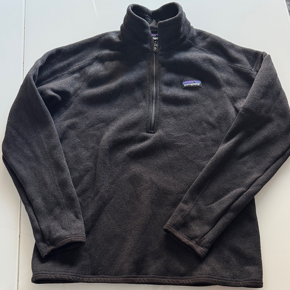Patagonia black half zip sweater with shoulder pockets